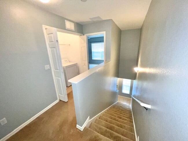 Building Photo - AVAILABLE NOW! Charming 2 Beds 2.5 Bath Townhome! 2 MASTER SUITES! Attached one car garage!! Extr...