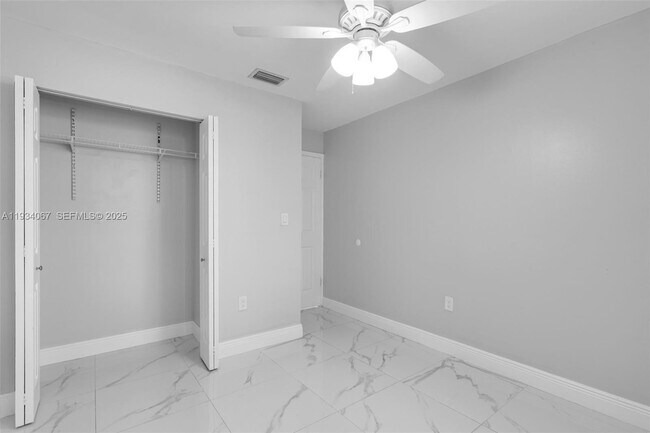 Building Photo - 5061 W 12th Ln