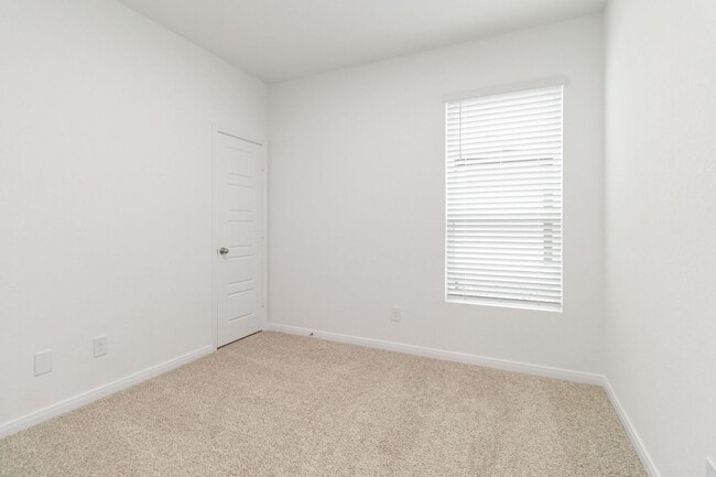 Building Photo - New Construction Townhome with High Ceilings & 2-Car Garage