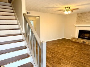 Building Photo - Welcome to this stylish and contemporary 2-bedroom, 1.5-bathroom corner townhome in Stockbridge!