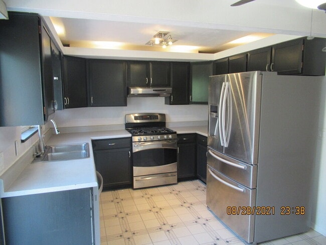 Building Photo - "Charming 4-Bed Arvada Home with Hardwood Floors & Finished Basement!"