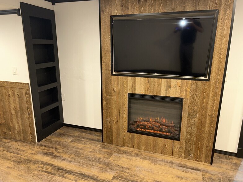 living room tv and fireplace - 800 Main St