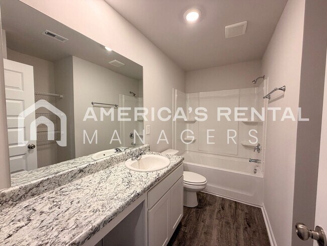 Building Photo - Spacious Two-Story Townhome with Open Layout!