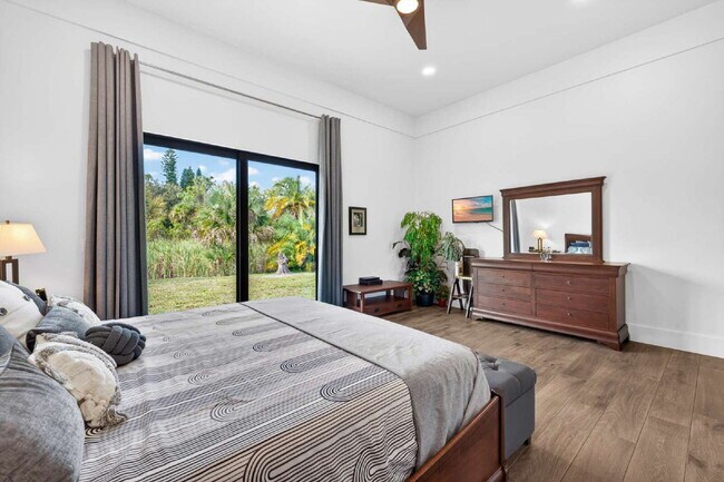 Building Photo - Newly built upscale home on a private 1-acre lot in the quiet Bell Villa community of Bonita Spri...