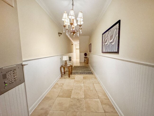 Building Photo - Fully Furnished Waterfront Elegance on Mai...