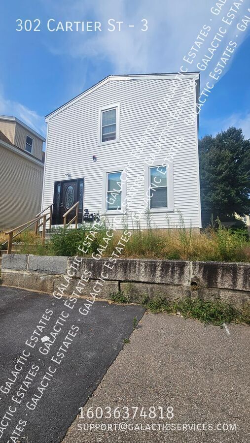 Building Photo - 302 Cartier St