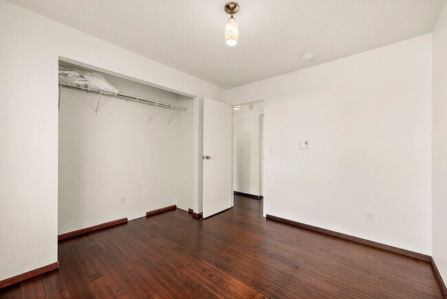 Building Photo - Top-Floor Condo with Panoramic Lake Easter Views, Vaulted Ceilings & Modern Updates!