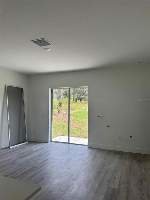 Building Photo - 9187-9189 N Travis Dr