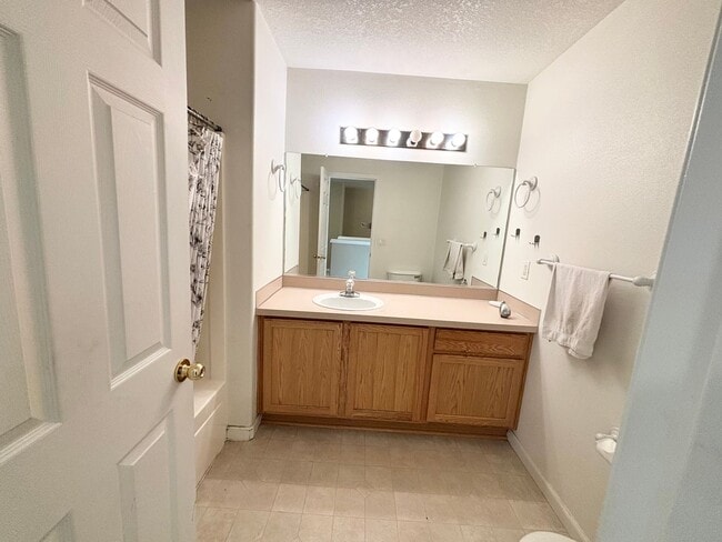 Building Photo - Stunning Remodeled Home with Office, A/C, Fenced Yard & Flexible Living Space!