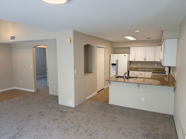 Building Photo - Spacious 4-bed, 3-bath home on a quiet cul-de-sac — no lawn maintenance required.