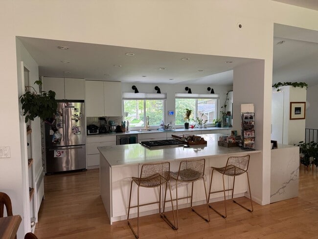 Building Photo - large modern home with big backyard, peace...