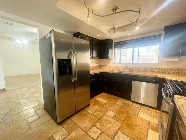 Building Photo - AVAILABLE NOW!! 3 Bedroom/2 Bathroom Cathedral City Pool Home!!  MOVE IN SPECIAL HALF OFF ONE MON...