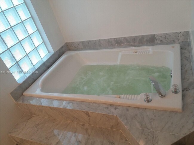 Building Photo - 17275 Collins Ave