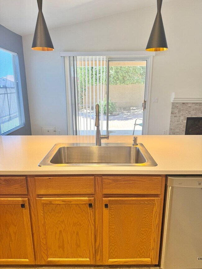 Building Photo - Meticulously Maintained 3 Bedroom + Den Single Level Home! Fantastic Low Backyard.