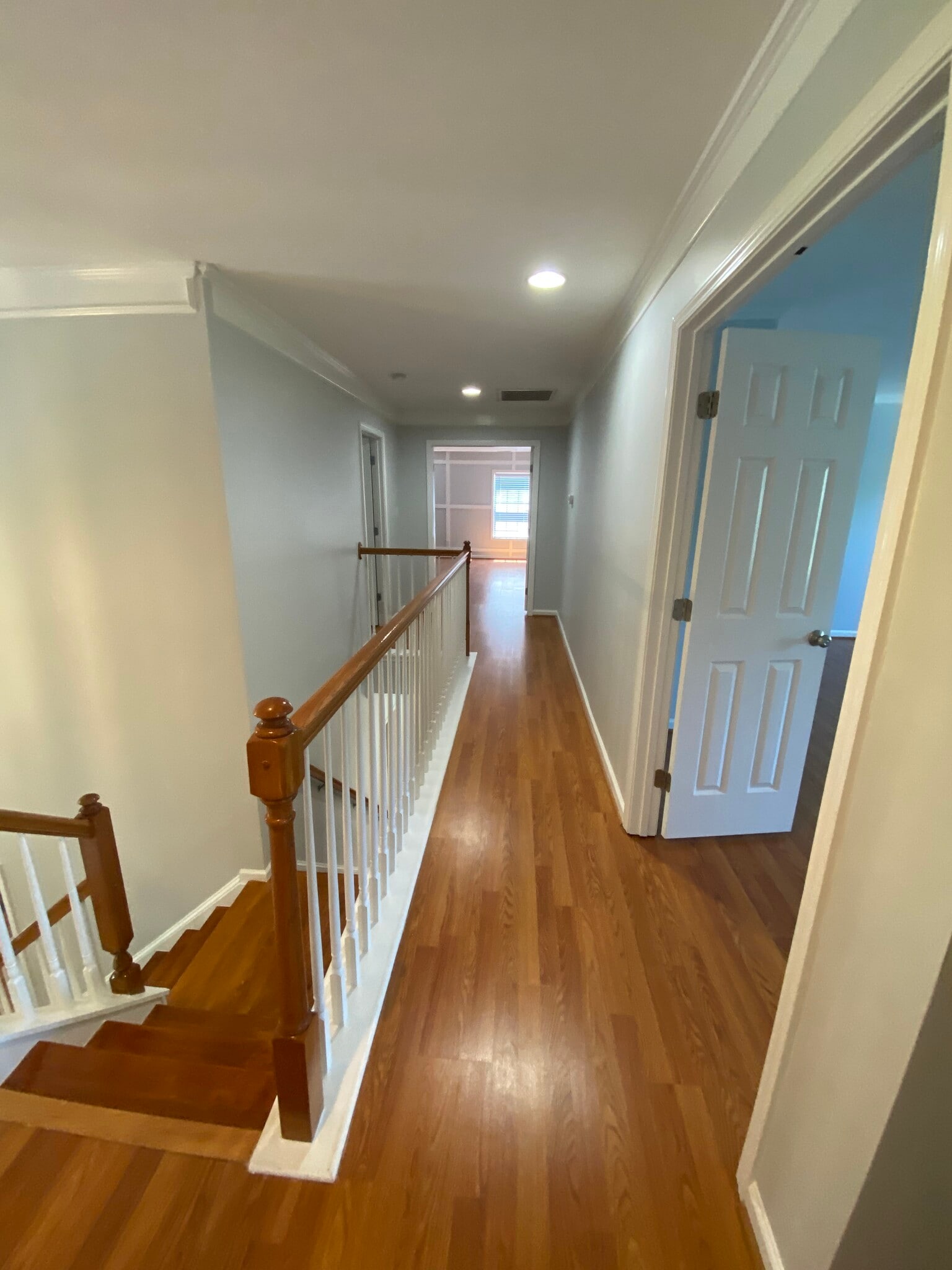 upstairs hallway with view of master bedroom - 10102 Glenburn Ln