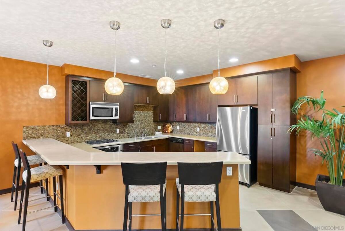 Entertainer’s kitchen in shared lounge — ideal for events or hosting. - 3687 4th Ave
