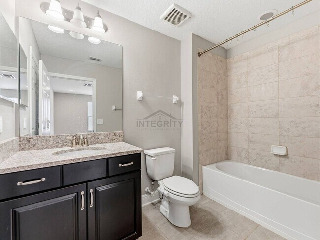Building Photo - 8947 Garden Party Dr