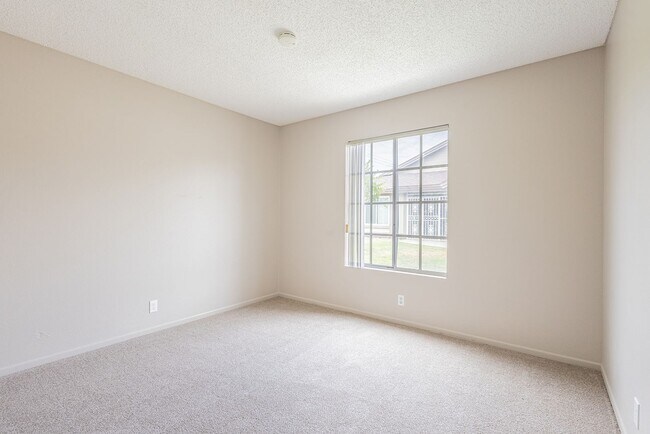 Building Photo - Spacious Single-Story 3-Bedroom Condo with Private Patio and 2-Car Garage