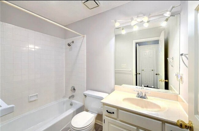 Building Photo - COMING SOON: Charming 2-Bedroom Condo in a...