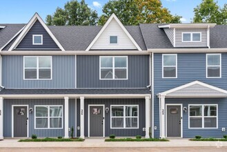 Building Photo - NEW TOWN HOMES NEAR BILLY DUNLOP PARK