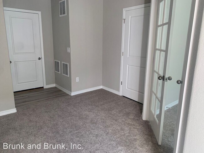 Building Photo - 3 br, 3.5 bath House - 7422 Mount Elbert P...