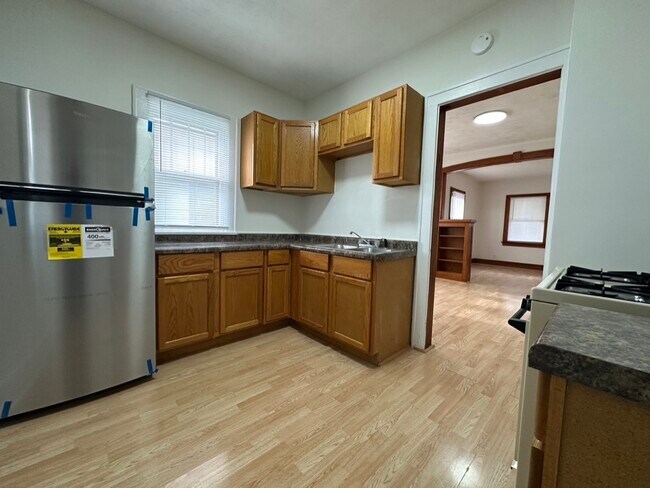 New fridge in kitchen - 5371 N 27th Ave