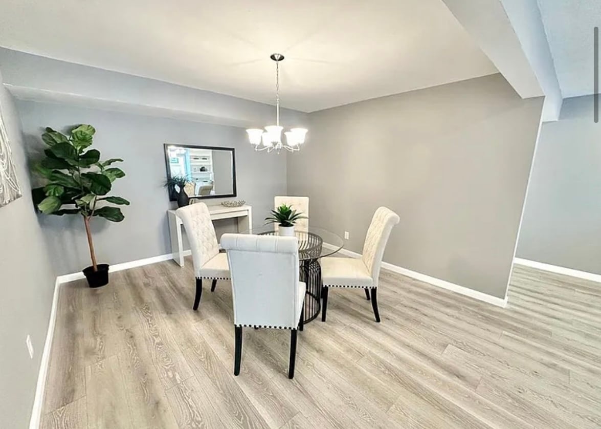 Staged front area dining - 10341 Forest Brook Ln