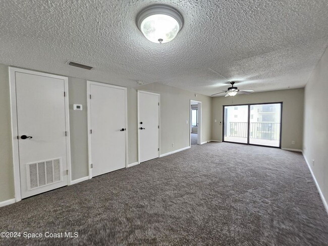 Building Photo - Coastal Paradise Awaits: Elegant 2-Bed, 2-...