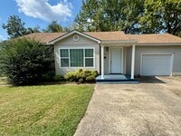 Building Photo - Spacious Home with Garage, Deck & Convenient Location