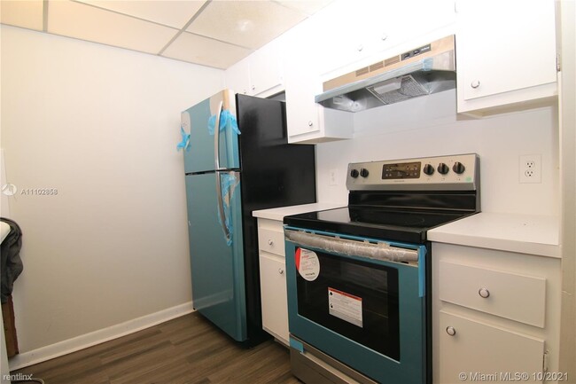 Building Photo - 1 br, 1 bath Condo - 151 SW 135th Ter Apt ...