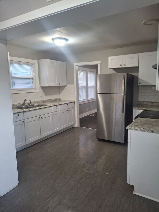 Building Photo - Four bedroom house for rent