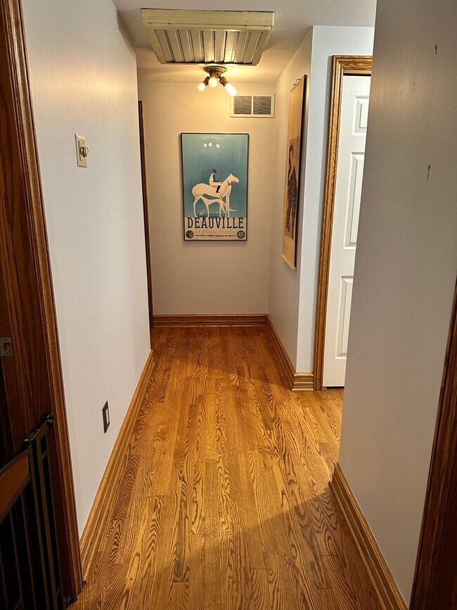 Building Photo - Dream Home in Highland, Michigan: Your Private Oasis on 5 Wooded Acres