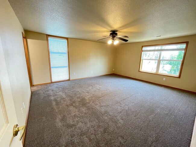 Building Photo - Spacious 4-Bedroom, 2.5-Bath Home with Deck, Fireplace & Updated Kitchen