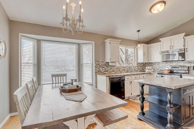 Building Photo - Spacious West Jordan Home Backing to Duck Pond & Trails | Large Yard + Garage