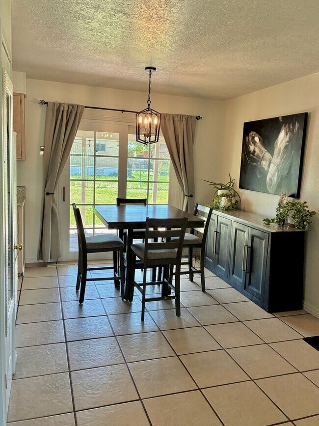 Building Photo - Beautifully remodeled home with central air, 1 car garage, RV parking and covered patio