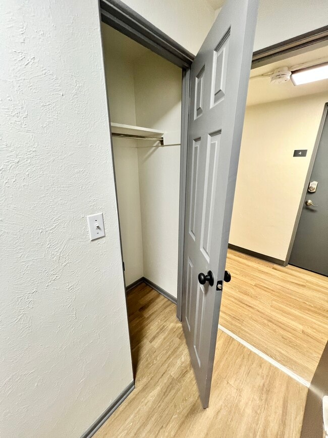 Explore the functional storage solutions in this modern apartment. - Melody Apartments