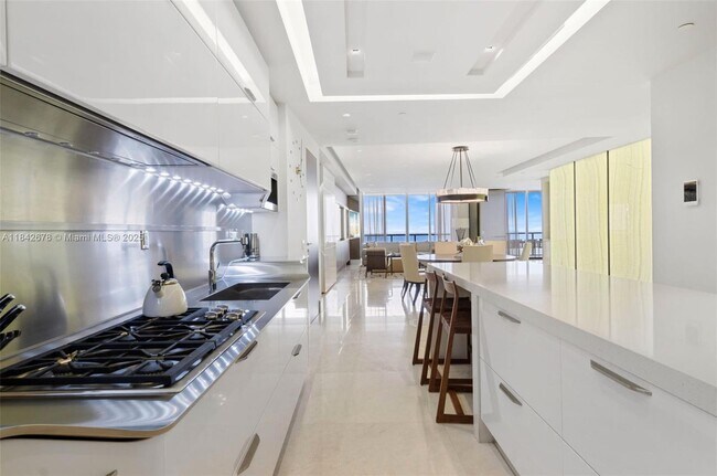 Building Photo - 9701 Collins Ave