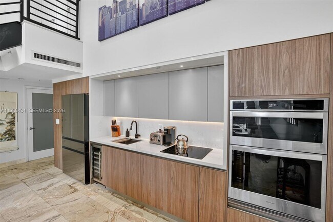 Building Photo - 7744 Collins Ave