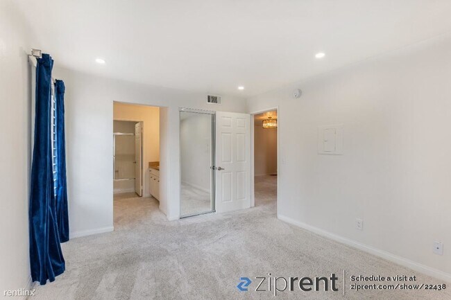 Building Photo - 1 br, 1 bath Condo - 5545 Canoga Ave, Wood...