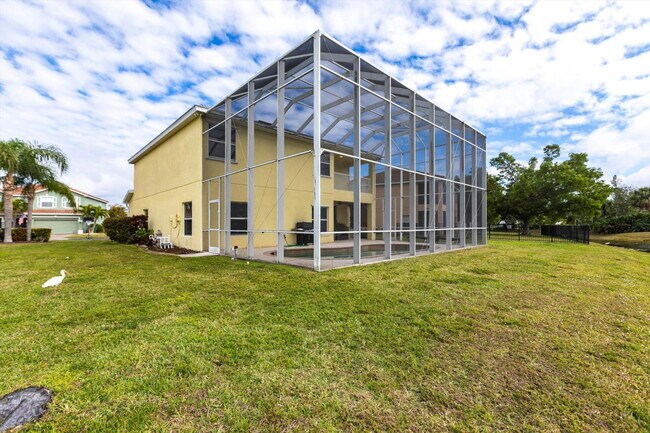 Building Photo - Rare 5 Bedroom Pool Home in Gated Community