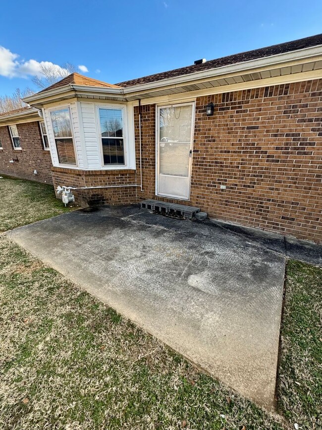 Building Photo - Well maintained brick home on a nice corne...