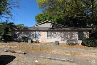 Building Photo - 6801 Tiki Ln
