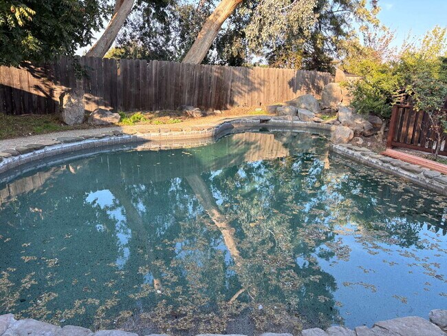 Building Photo - "Completely Remodeled and Charming 3-Bed Oasis with Pool & Fireplace in Pittsburg's Heart!"
