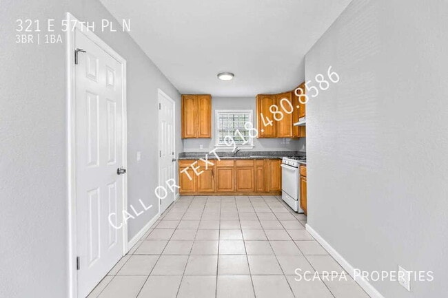 Building Photo - 321 E 57th Pl N