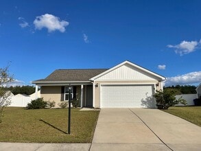 Building Photo - Don't miss this cute 3BR/2BA home in St. John's Ridge w/ attached garage!