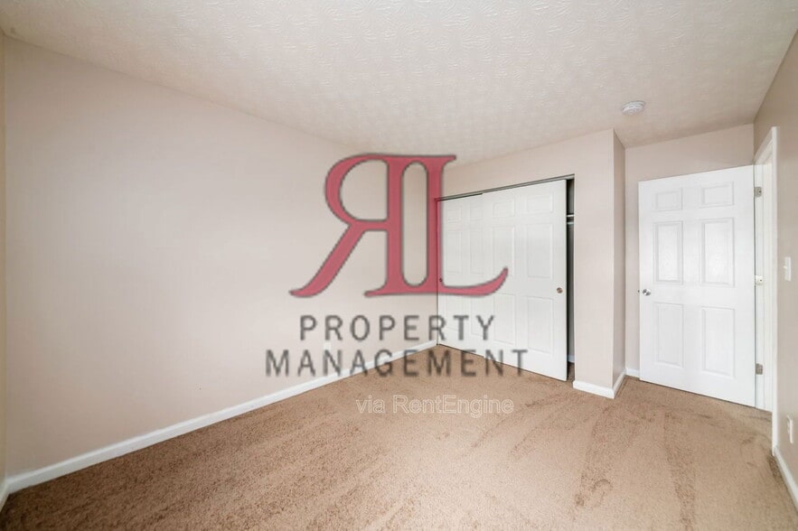 Building Photo - 7179 Feather Ct