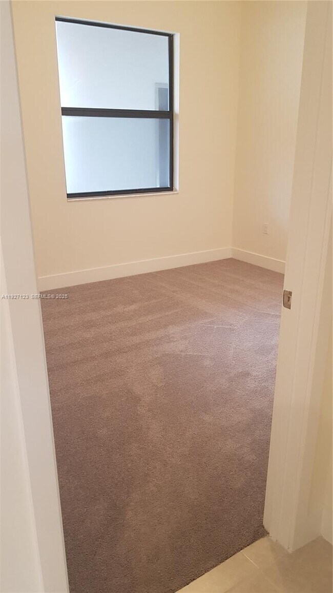 Building Photo - 8195 NW 104th Ave