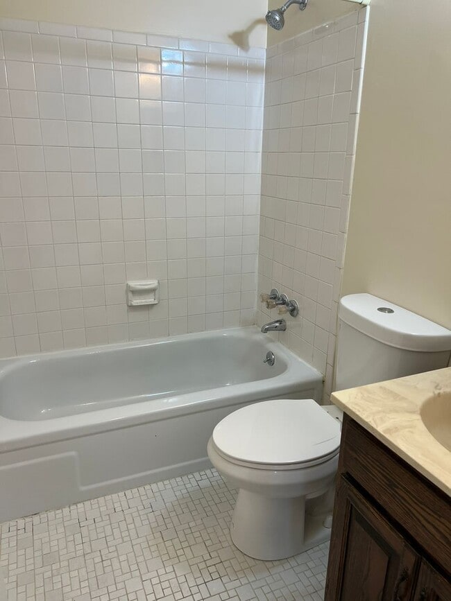 Building Photo - Wonderful end unit in Downtown Bethesda, 1 Mi. to Bethesda Metro