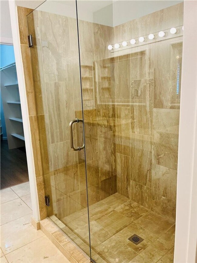 Building Photo - Amazing condominium in gated upscale neigh...