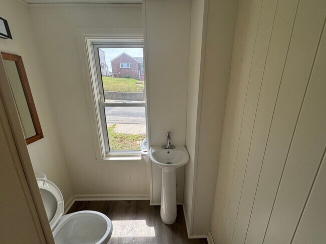 Building Photo - Spacious rooms, updated mechanicals, and convenient Canonsburg living